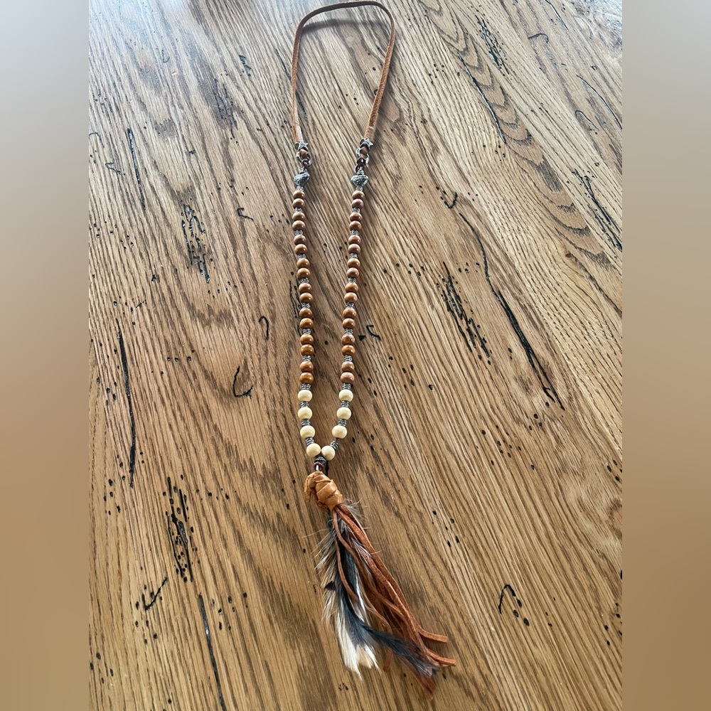 Long Bohemian style bead and leather/feather necklace